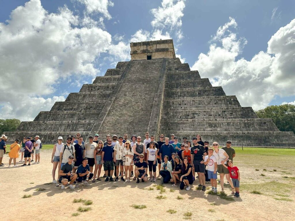 How to organize a retreat: Team photo of OpenPhone at Chichen Itza. 